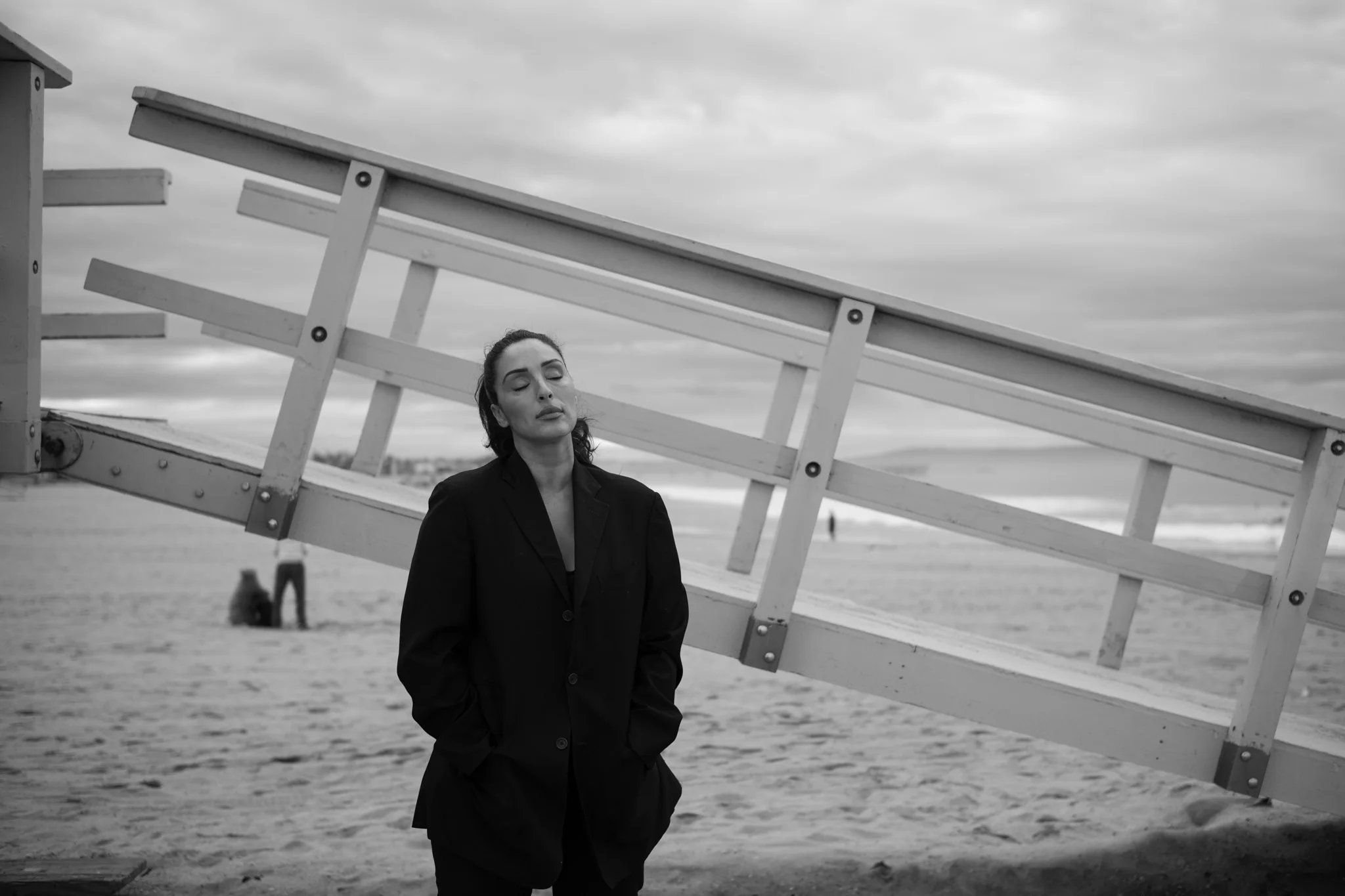 woman_contemplative_beach.webp